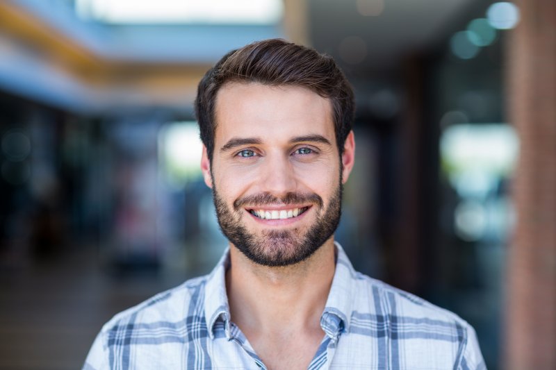 person who had a smile makeover smiling